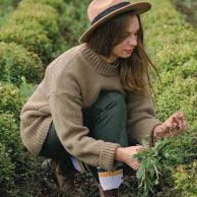 woman harvesting spring veg